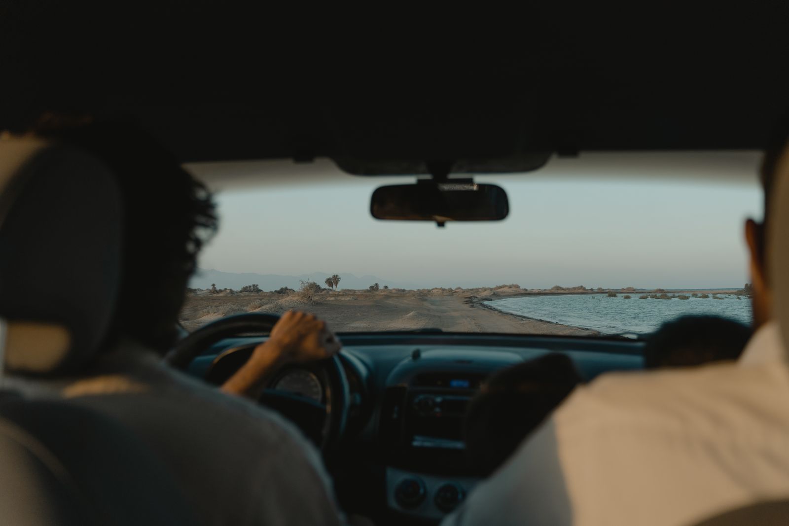 A person driving a car